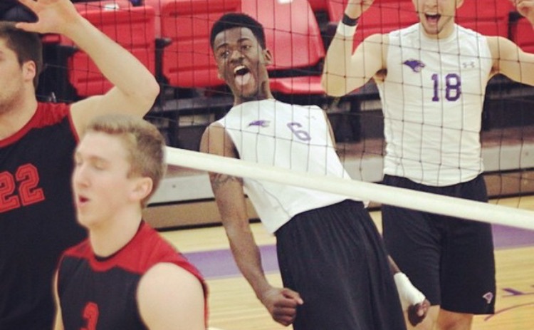 Going for the win: the men’s volleyball team hits the net